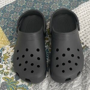 Charcoal gray Crocs men’s 9, ladies 11